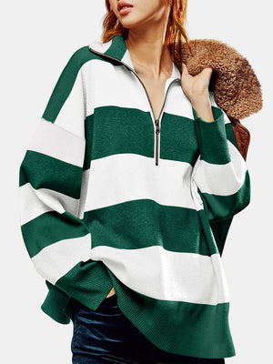 Oversized zip-up pullover in dark green and white rugby stripes, acrylic knit.