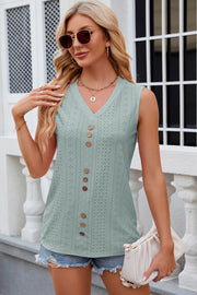 Sage perforated button-down sleeveless blouse with V-neck and wooden buttons.