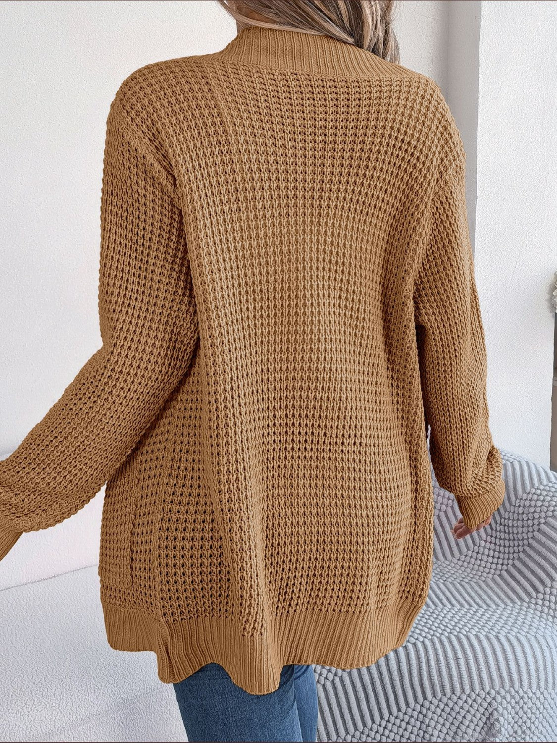 Caramel textured knit open-front cocoon cardigan with long sleeves and ribbed hem.