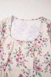 Floral print peplum blouse with square neck and ruffled hem
