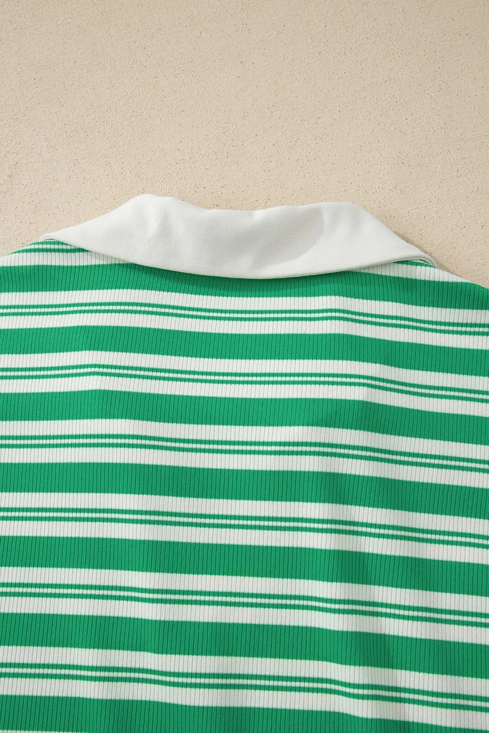 Green and white striped midi dress with collared V-neck and pockets