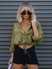 Cropped utility shirt in matcha green cotton with drawstring waist and button-down front.