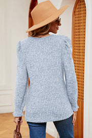 Light Blue ribbed knit tee with square neck, puff sleeves, and ruffled cuffs.