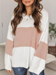 Colorblock knit pullover sweater in blush pink and white with drop shoulders.