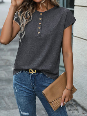 Dark gray slouchy henley tee with cuffed sleeves and wooden buttons, styled with jeans.