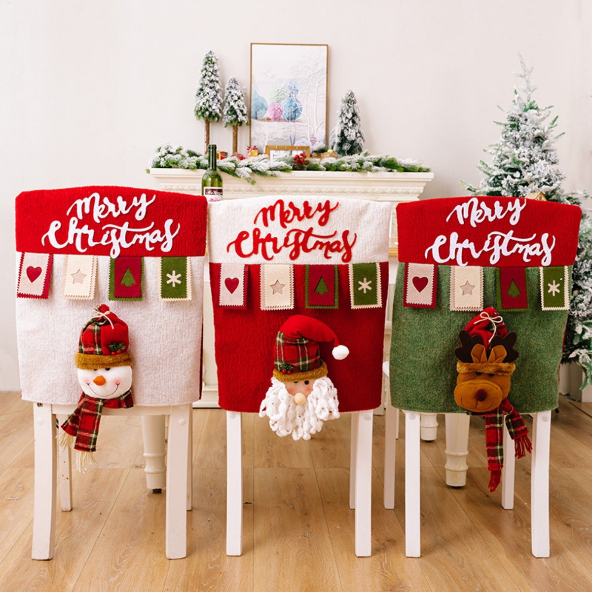 Christmas chair covers in red, white, and green feature Santa, snowman, and reindeer appliques.