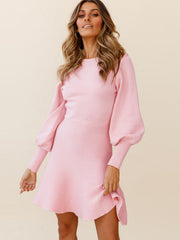 Pink knit fit-and-flare dress with balloon sleeves and ribbed skirt