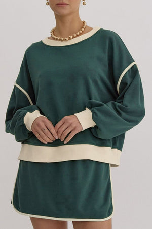 Dark green sweatshirt and skort set with cream contrast trim and crew neck