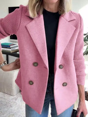 Pink double-breasted trench coat with knit sleeves and button detail
