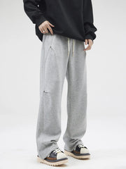 Grey casual loose-fit men's sweatpants with drawstring and pockets