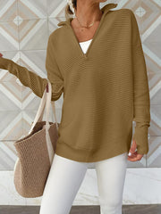 Camel ribbed knit pullover with funnel neck and quarter zip, long sleeves with thumbholes.