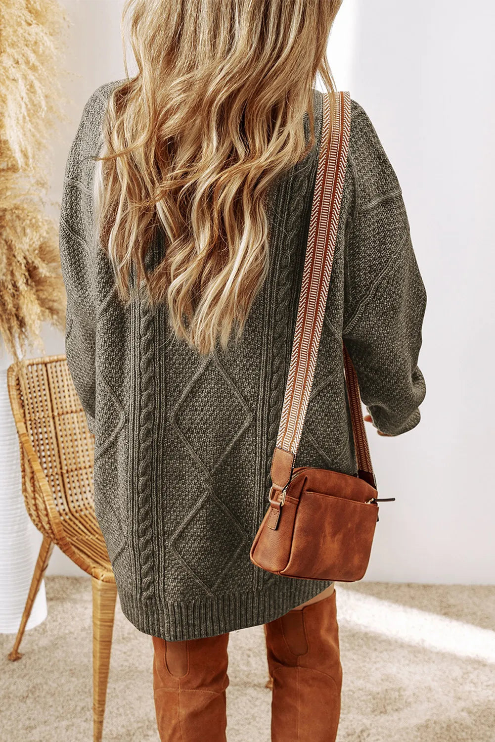 Cable knit sweater dress in sage with diamond pattern, crew neck, and long sleeves.