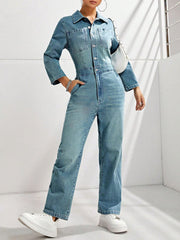 Structured light wash denim boiler suit with button front and chest pockets.