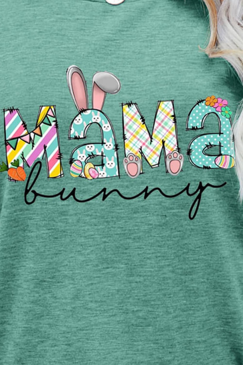 Maternity graphic tee in Gum Leaf green with Mama Bunny text and Easter graphics.