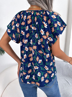 Dark Blue floral blouse with ruffle sleeves and tie neck, 100% polyester