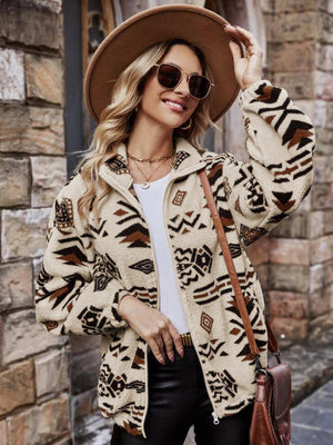 Aztec sherpa zip-up jacket in tan with a geometric pattern, featuring a stand-up collar.