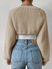 Khaki acrylic cropped bolero shrug with ribbed knit and balloon sleeves.