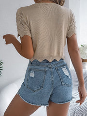 Khaki crochet knit top with scalloped hem and eyelet sleeves.