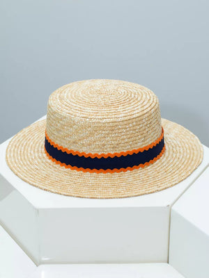 Straw boater hat with navy and orange scalloped band