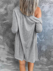Gray cotton button-down cardigan with long sleeves and pockets.