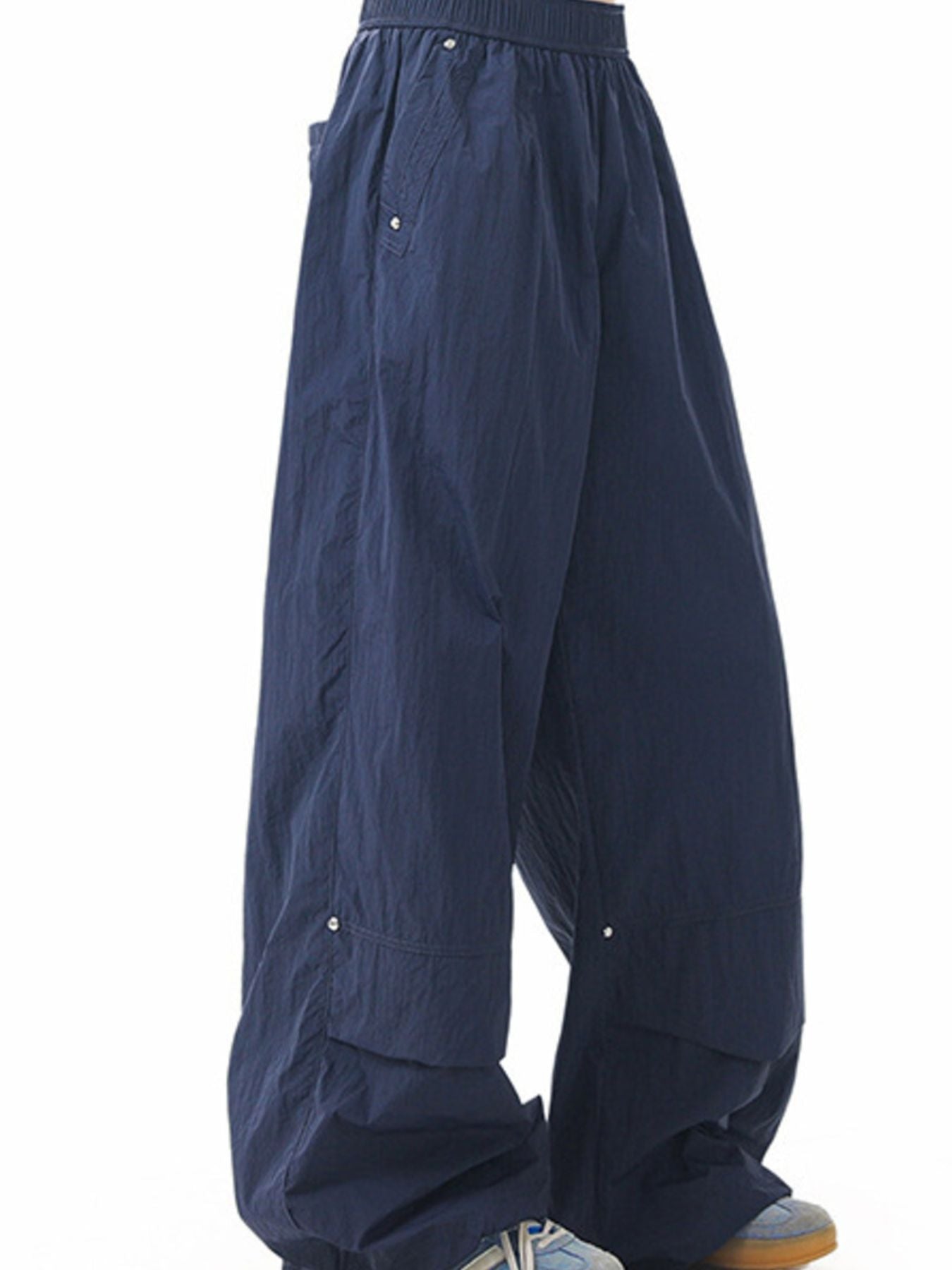 Men's dark navy lightweight cargo pants with elastic waist and side pockets.