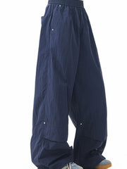Men's dark navy lightweight cargo pants with elastic waist and side pockets.