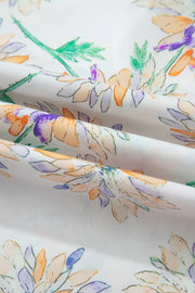 Floral print belted sleeveless dress fabric detail with watercolor flowers in orange, purple, and green on white.