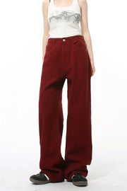 Burgundy wide-leg denim jeans with a relaxed fit and utility pockets.
