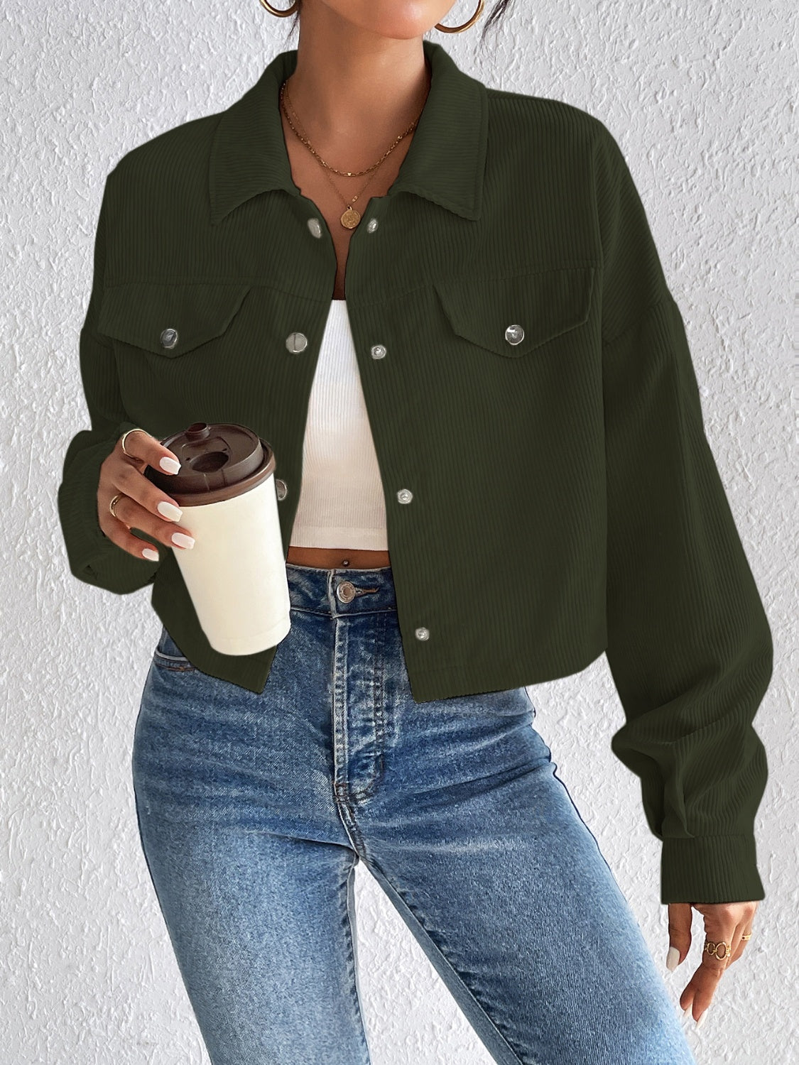 Cropped corduroy jacket in Army Green with snap front and chest pockets.