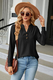 Black textured henley blouse with button detail and v-neck