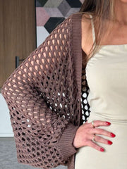 Chocolate open-knit crochet cardigan shrug with wide sleeves and ribbed cuffs.