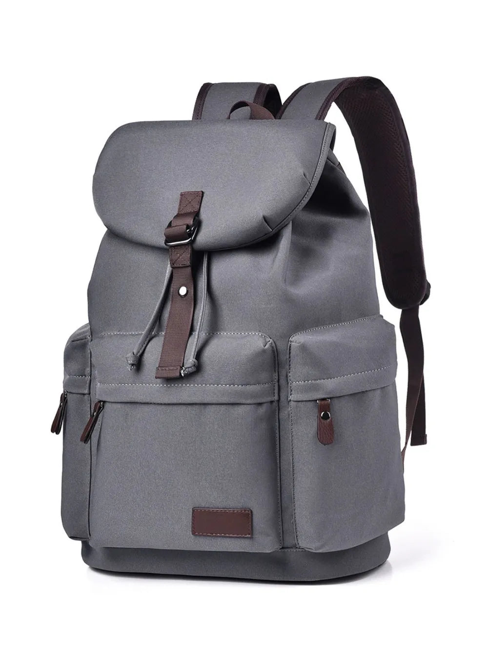 Gray canvas backpack with brown leather accents and multiple pockets.