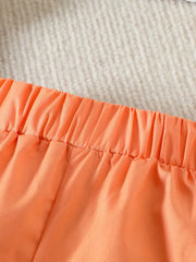Tangerine baby shorts with elastic waistband detail