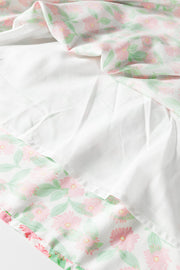Tiered mini dress with pink floral print and white lining