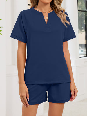 Navy blue loungewear set with v-neck top and shorts.