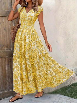 Yellow damask print maxi dress with cap sleeves and V-neck, cinched waist, tiered skirt.