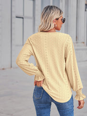 Canary yellow eyelet lace inset blouse with blouson sleeves and ruffled cuffs.