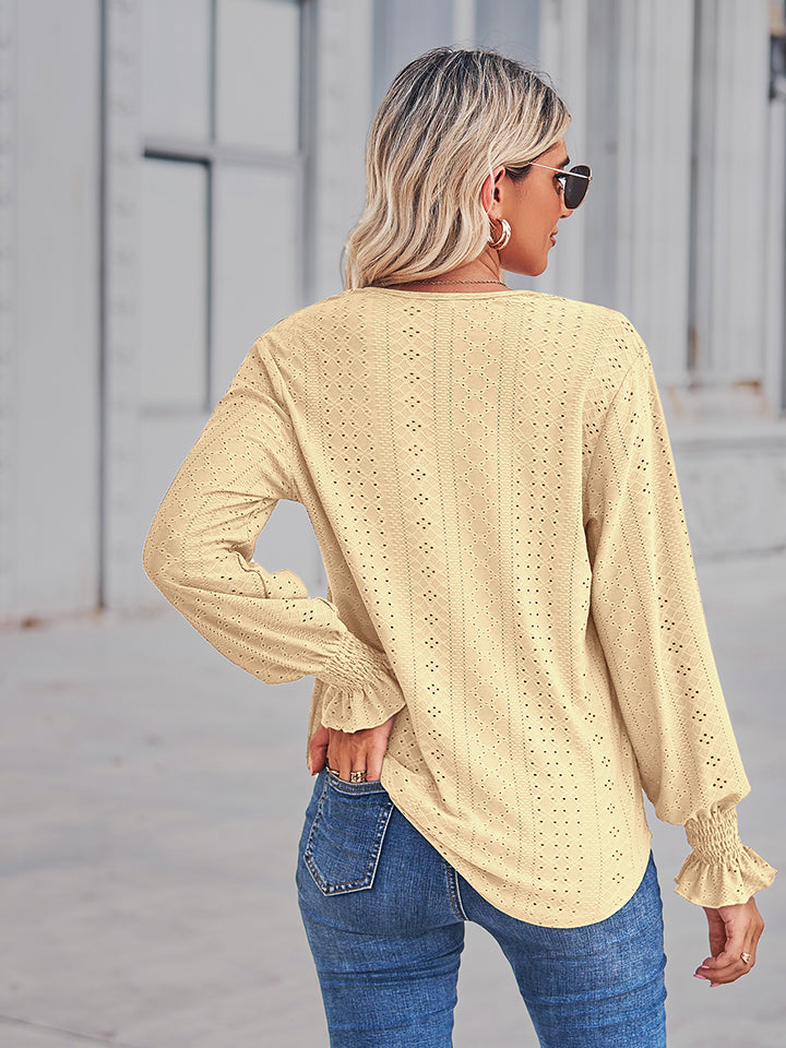 Canary yellow eyelet lace inset blouse with blouson sleeves and ruffled cuffs.