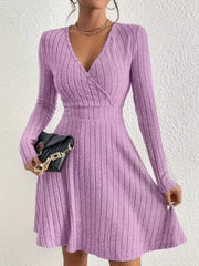 Lavender ribbed wrap mini dress with long sleeves and V-neck.