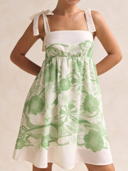 Green floral tie-strap mini dress with pockets and square neckline