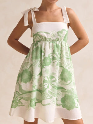 Green floral tie-strap mini dress with pockets and square neckline
