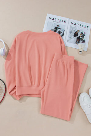 Pink plush corduroy lounge set with relaxed fit sweatshirt and pants