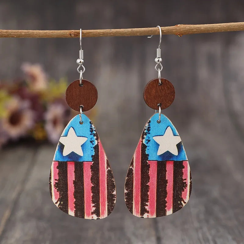 Patriotic wood teardrop earrings with American flag design and wooden accent.
