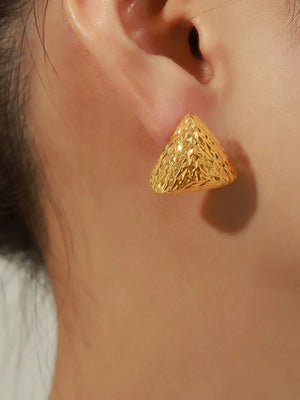 Textured gold triangle earrings with a geometric pattern.
