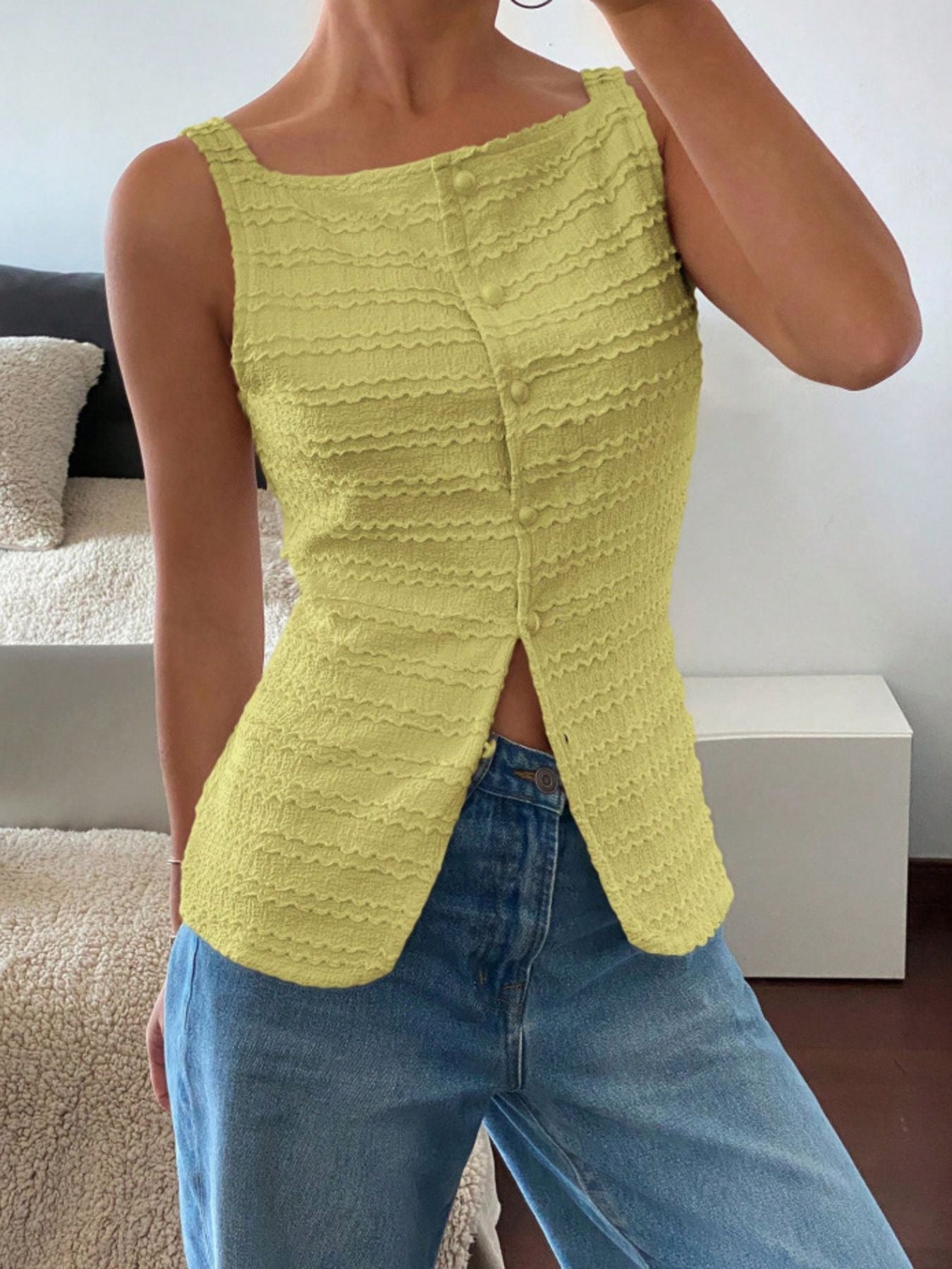 Yellow wavy textured button-front tank top with square neckline and side slits