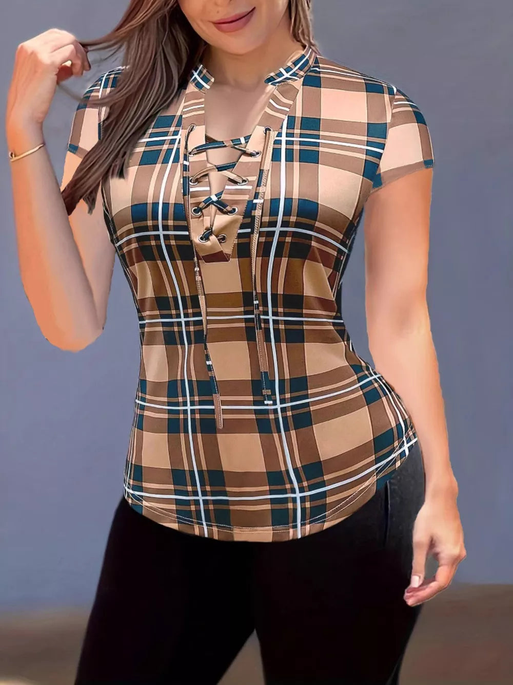 Brown plaid short sleeve shirt with lace-up neckline and curved hem