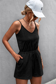 Black V-neck drawstring romper with adjustable straps and pockets.