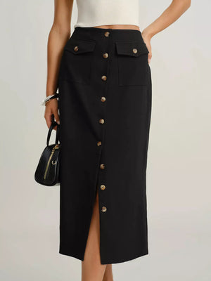 Black midi skirt with button front, pockets, and side slit.