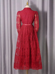 Red lace midi dress with button placket, collared neckline, and puff sleeves.