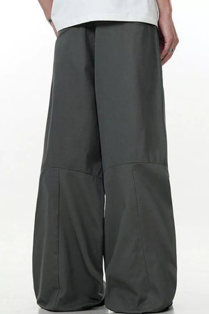 Men's wide leg cargo pants in army green with a relaxed fit.